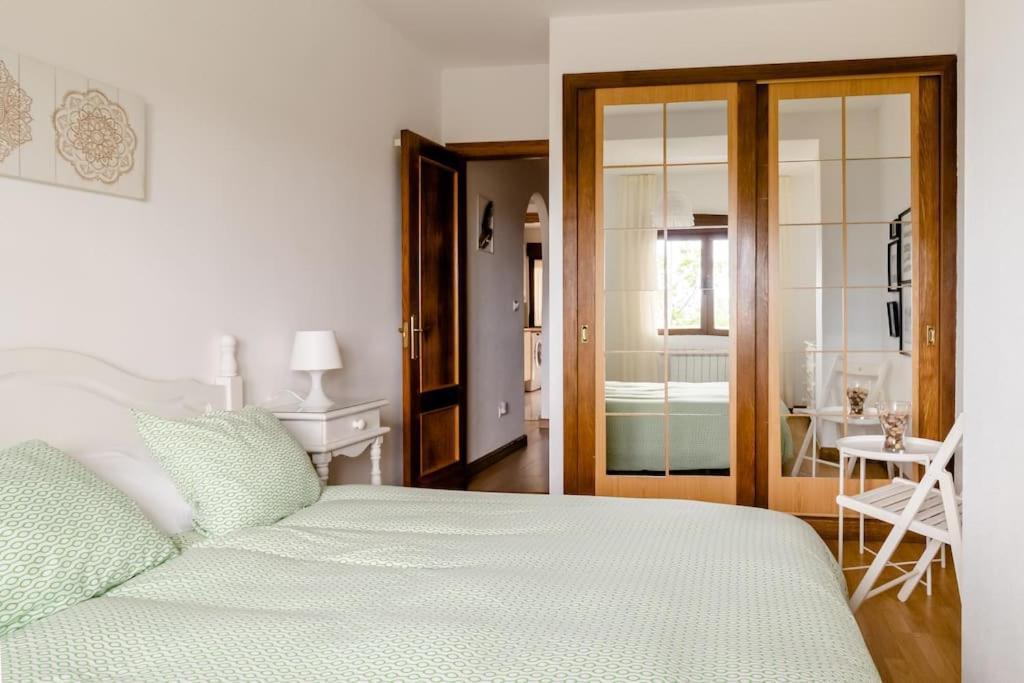 Casa De Las Flores - Apartamento Con Jardin Privado Frente A La Playa De Comillas Extérieur photo