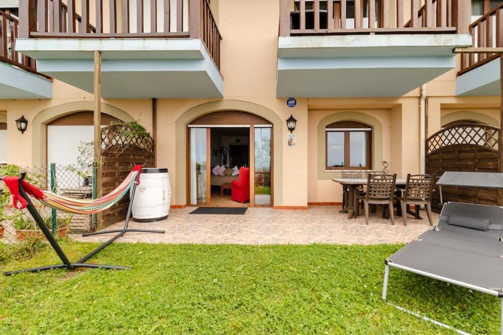 Casa De Las Flores - Apartamento Con Jardin Privado Frente A La Playa De Comillas Extérieur photo