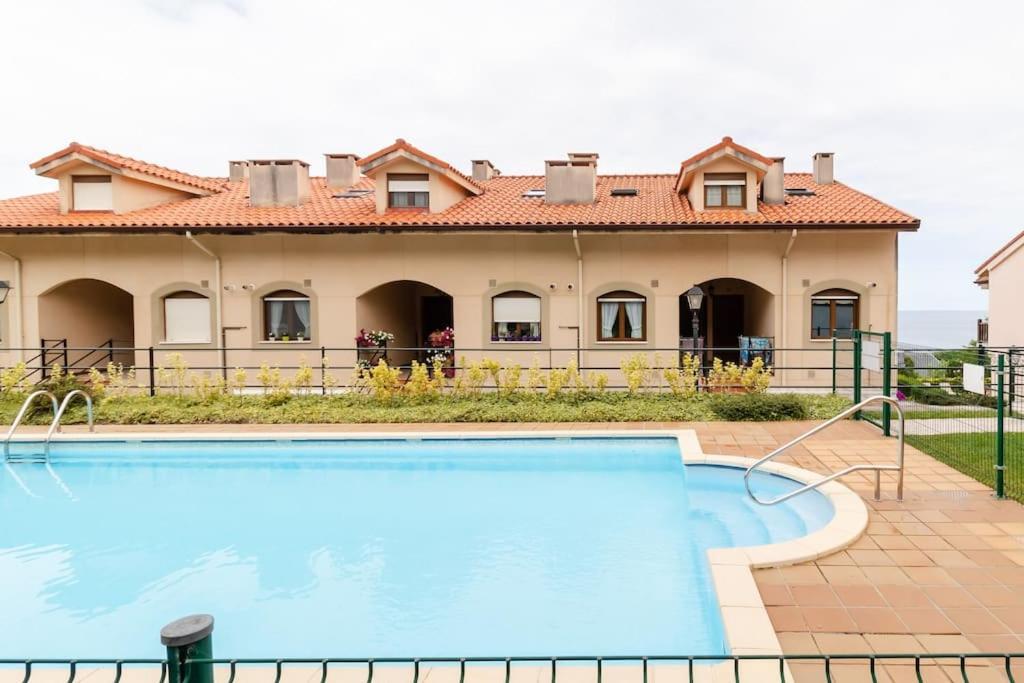 Casa De Las Flores - Apartamento Con Jardin Privado Frente A La Playa De Comillas Extérieur photo